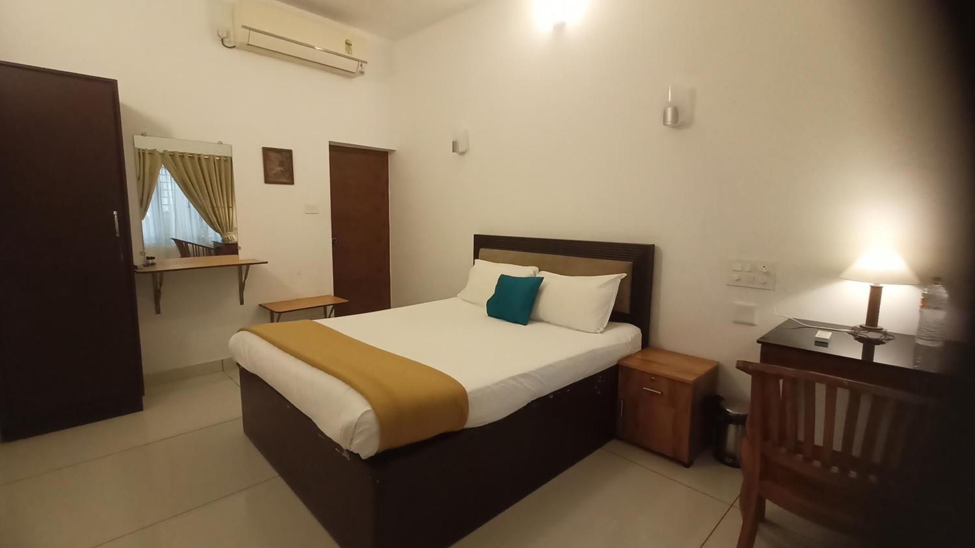 Athirapilly On The Rocks Hotel Athirappilly Kamer foto